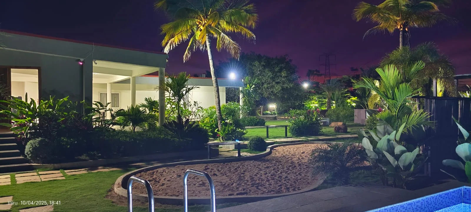 Night poolside view at Amara Haven