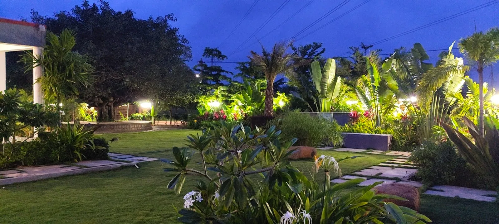 Landscaped Amara Haven garden at night