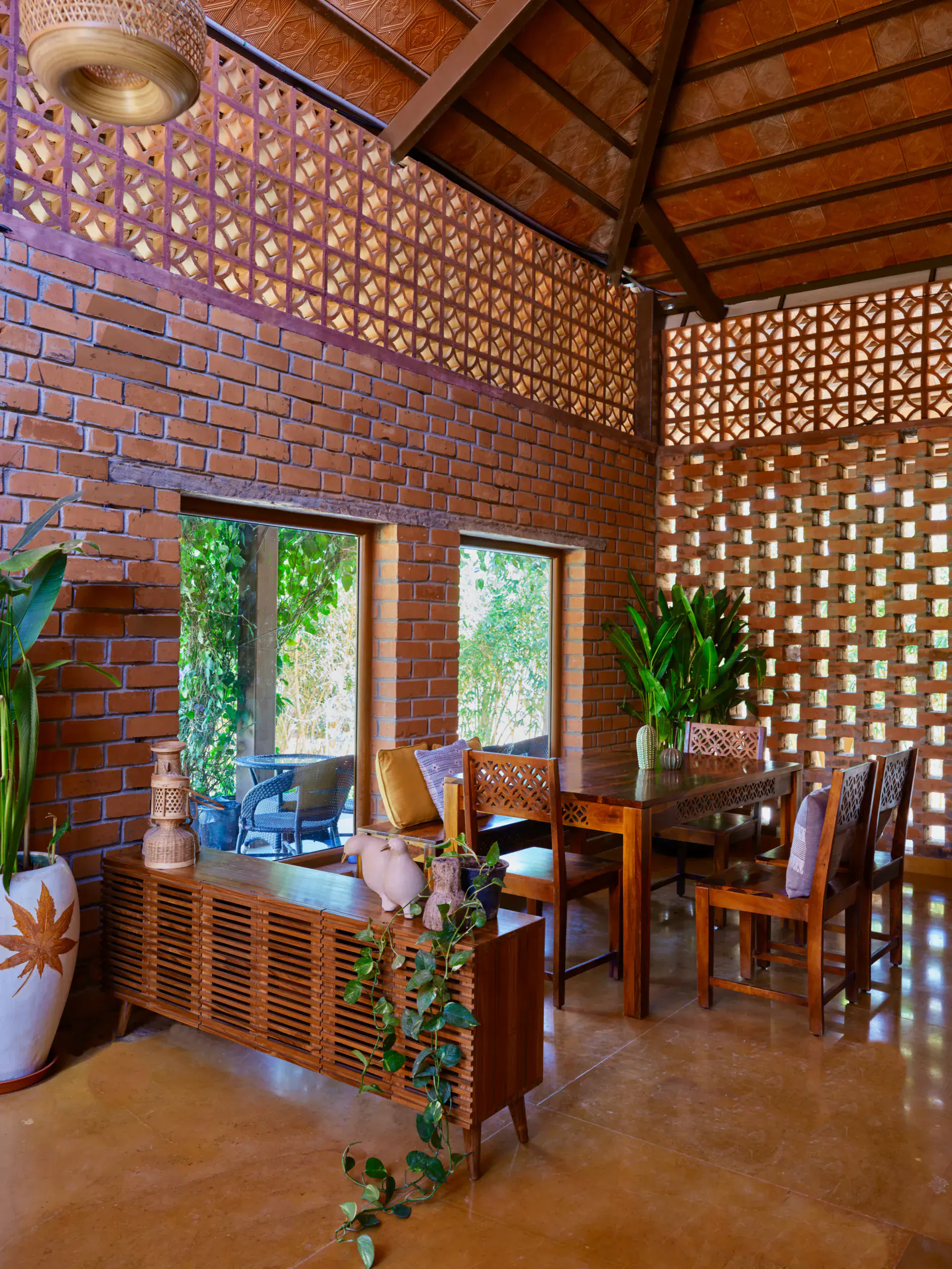 Open brick courtyard and gathering space at CoQuitos