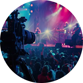Live event production with stage lights and camera